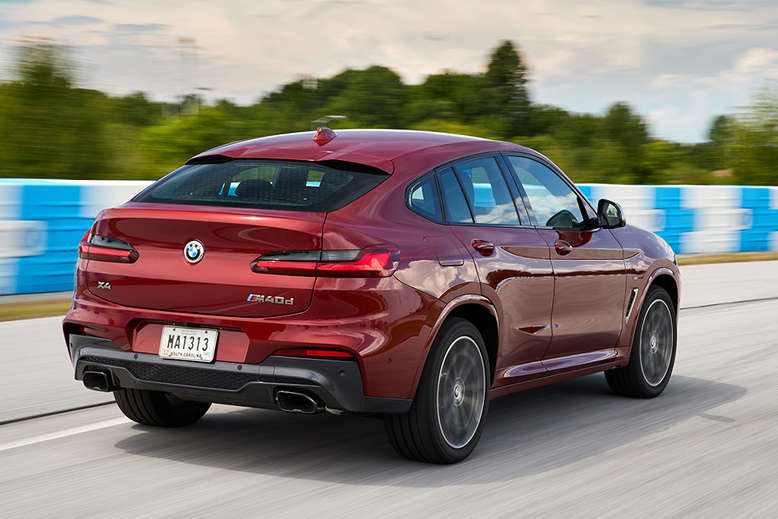 BMW X4, seitliches Heck, Fahrtaufnahme